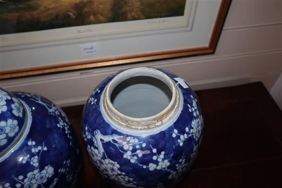 A pair of Chinese blue and white jars and covers, c.1900, Kangxi mark (one a.f.)